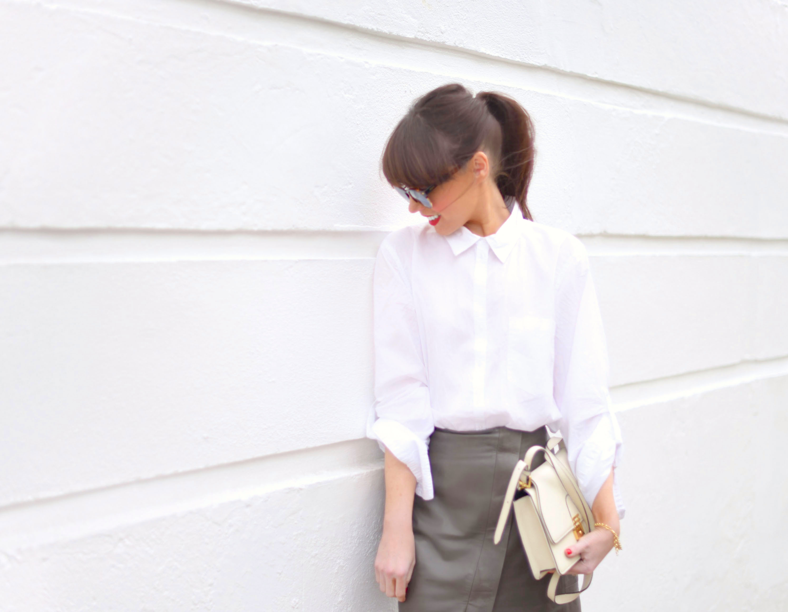 white shirt and leather skirt